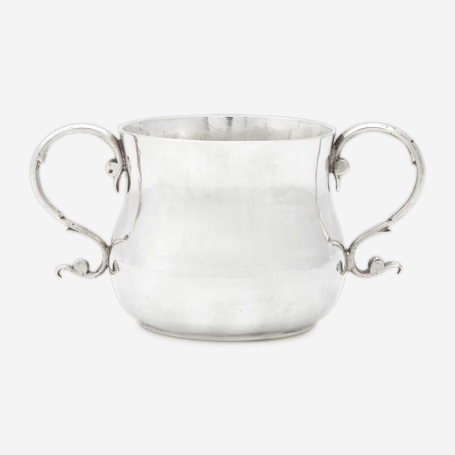 Lot 56 - A silver caudle cup