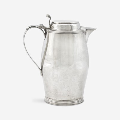 Lot 79 - A silver covered pitcher