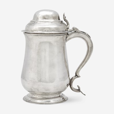 Lot 78 - A silver covered tankard