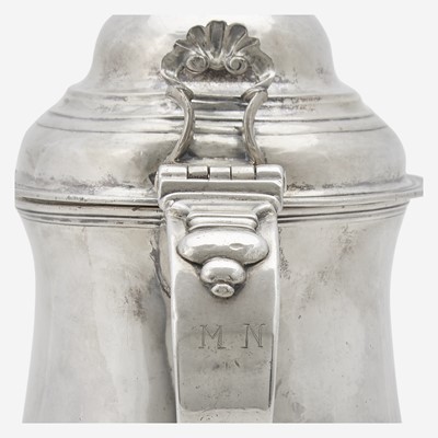Lot 78 - A silver covered tankard