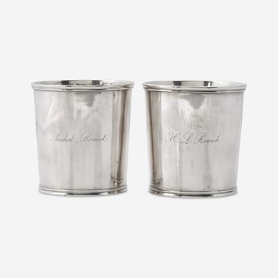 Lot 184 - A pair of silver beakers