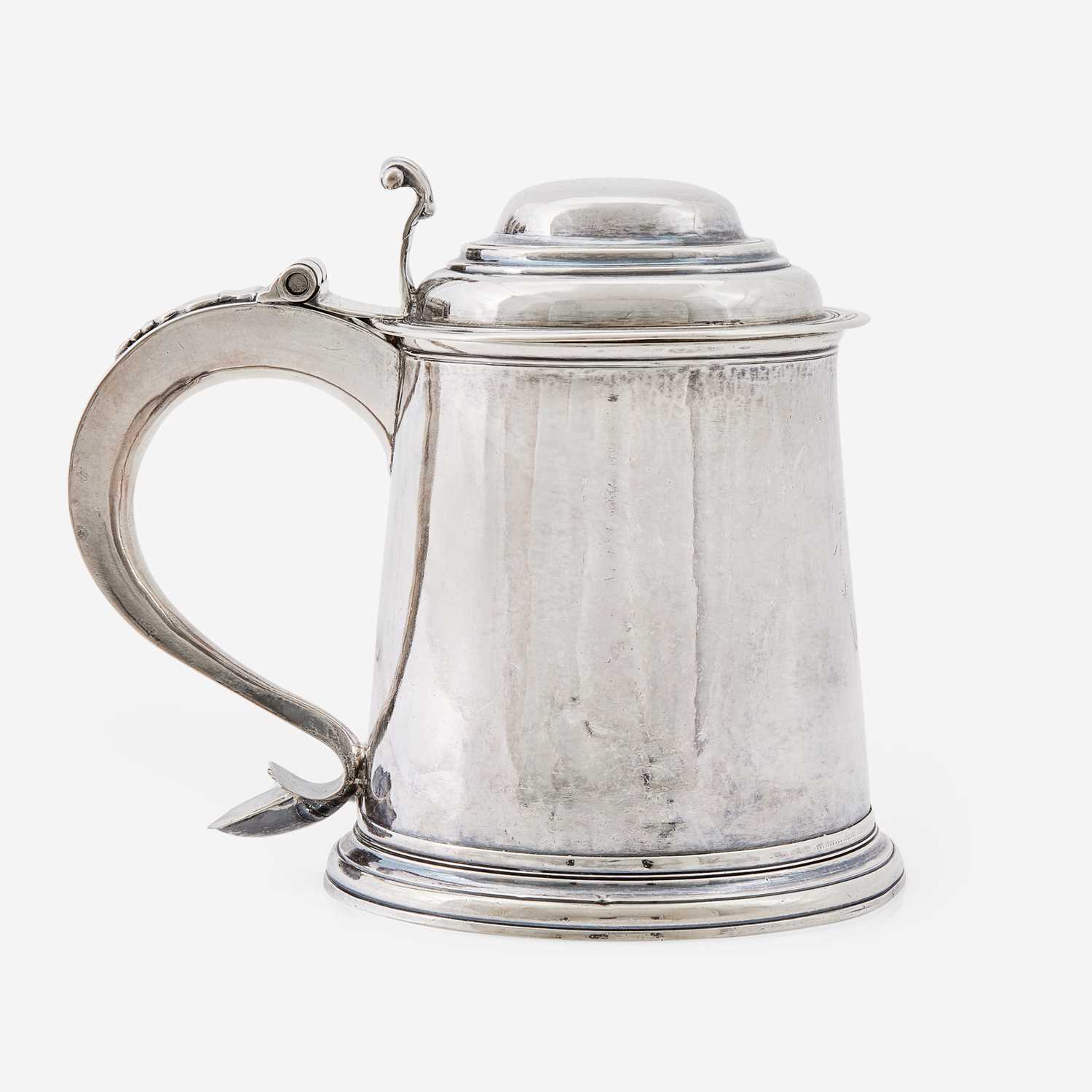 Lot 85 - A silver covered tankard