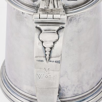Lot 85 - A silver covered tankard