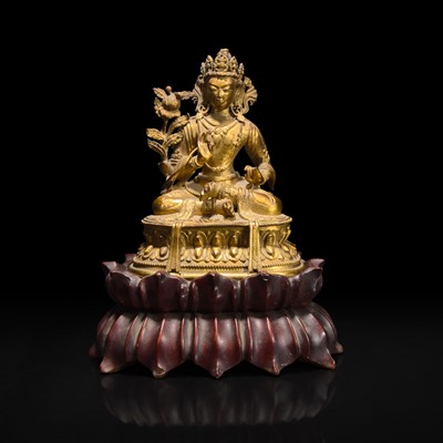 Lot 45 - A small Sino-Tibetan gilt-bronze figure of a bodhisattva 中原或西藏地区铜鎏金佛造像