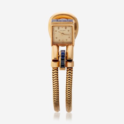 Lot 186 - An eighteen karat gold and synthetic sapphire bracelet watch, Chaumet