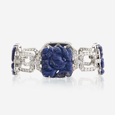 Lot 115 - A lapis lazuli, diamond, and eighteen karat white gold bracelet