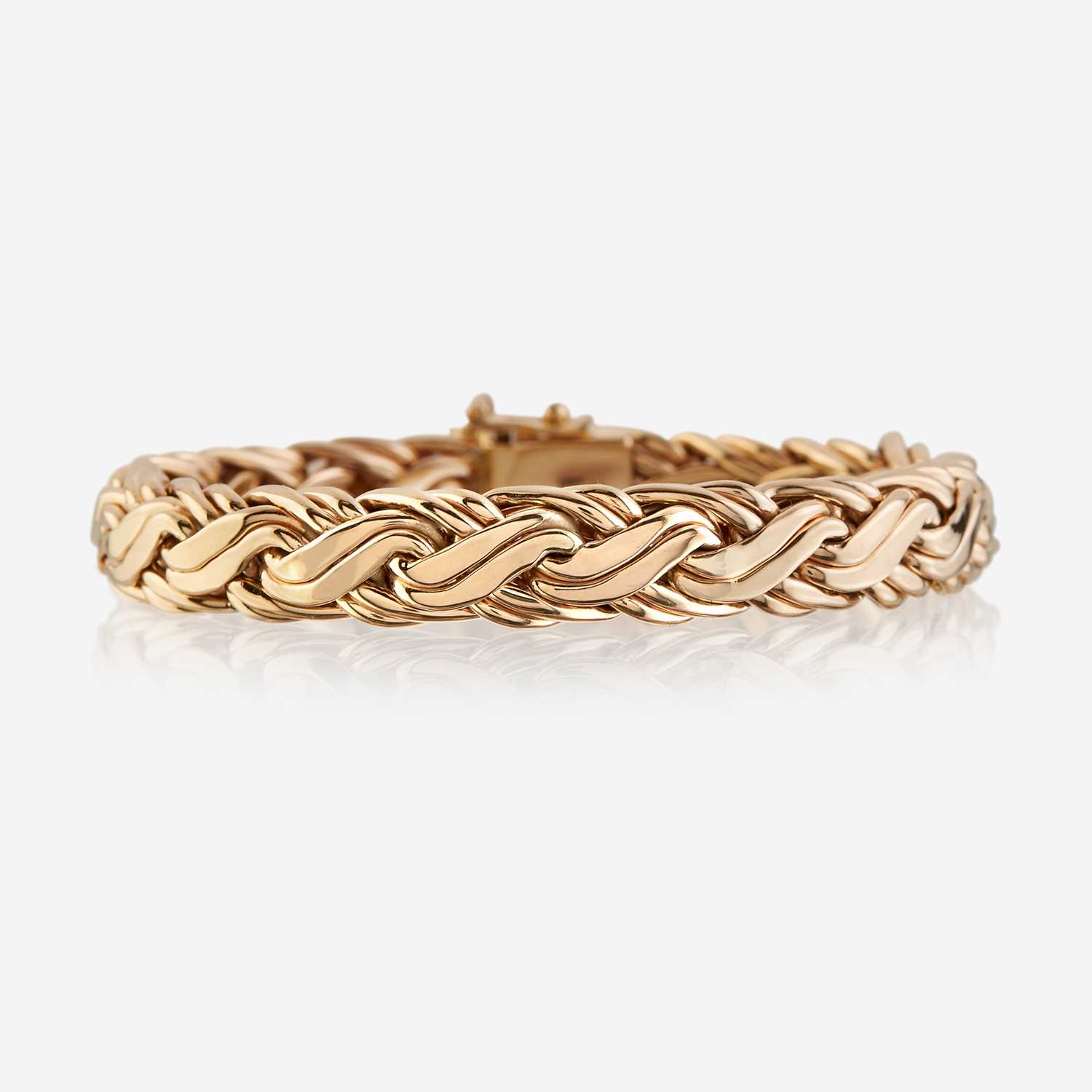 Lot 97 - A fourteen karat gold bracelet, Tiffany & Co.