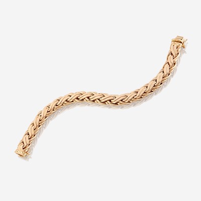 Lot 97 - A fourteen karat gold bracelet, Tiffany & Co.