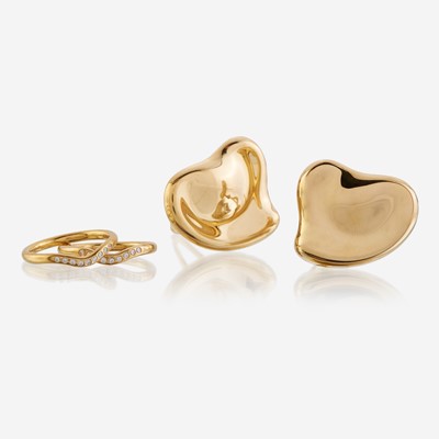 Lot 104 - A pair of eighteen karat gold earrings, together with two diamond and eighteen karat gold rings, Tiffany & Co.