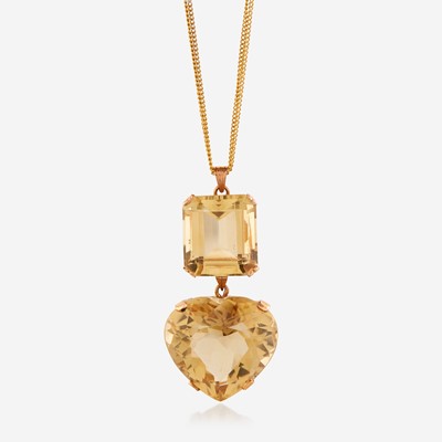 Lot 143 - A citrine and eighteen karat gold pendant/necklace