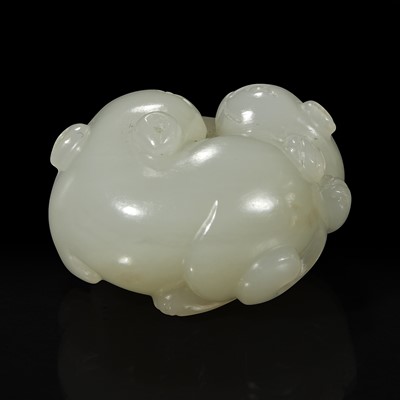 Lot 128 - A small Chinese white jade "Cats" toggle 白玉双欢