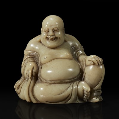 Lot 57 - A Chinese carved soapstone figure of a seated Budai 寿山石雕布袋和尚