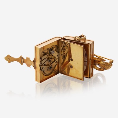 Lot 1 - A fourteen karat gold and enamel keepsake pendant watch, Swiss