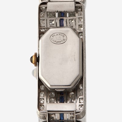 Lot 180 - An Art Deco platinum, diamond, and synthetic sapphire bracelet watch, Mauboussin