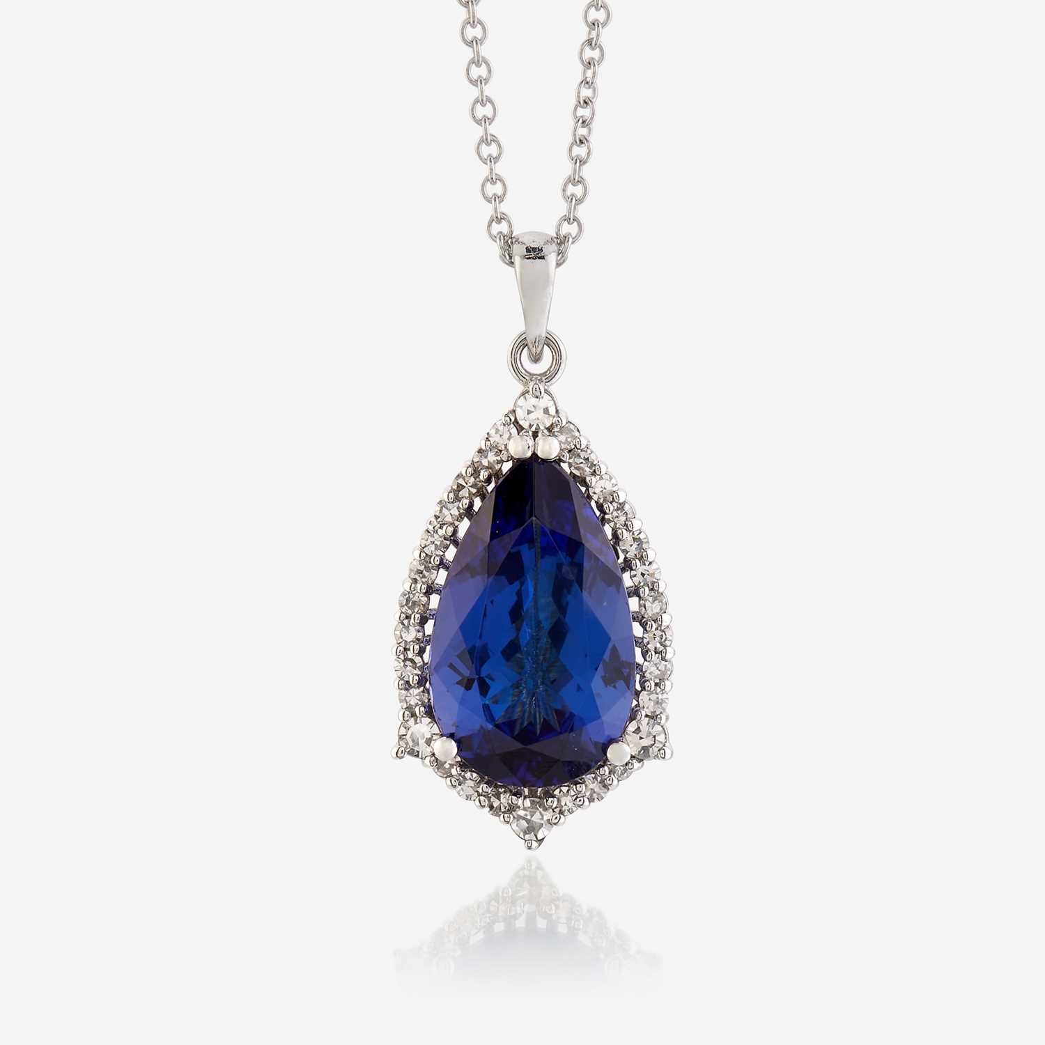 Lot 79 - A tanzanite, diamond, and eighteen karat white gold pendant and necklace