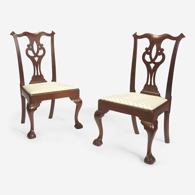 Lot 97 - A pair of Chippendale carved walnut side chairs