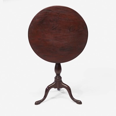 Lot 75 - A Queen Anne carved mahogany tilt-top candlestand