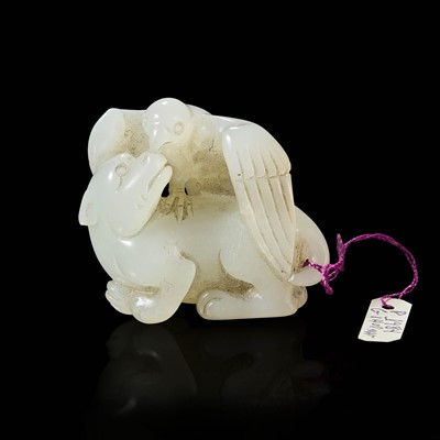 Lot 95 - A Chinese carved white jade bird and beast pendant 玉雕一件