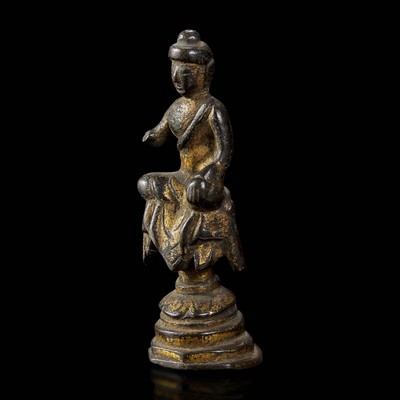 Lot 64 - A small gilt bronze figure of a seated Buddha 铜鎏金佛造像一尊