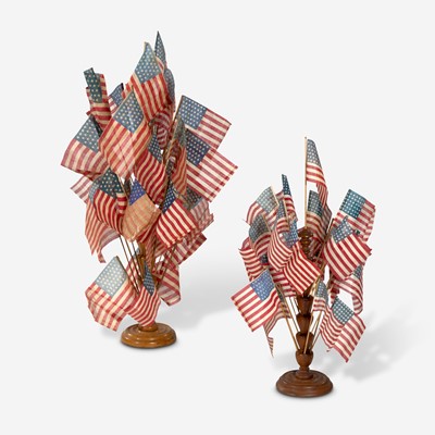 Lot 48 - Two turned wooden flag holders