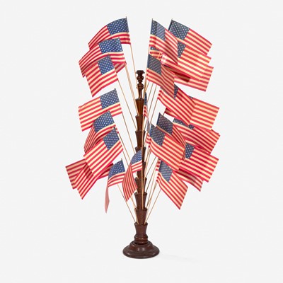 Lot 49 - A turned wooden flag tree stand