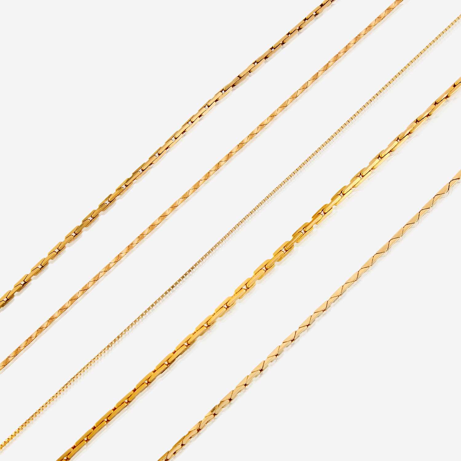Lot 147 - A collection of five fourteen karat gold necklaces