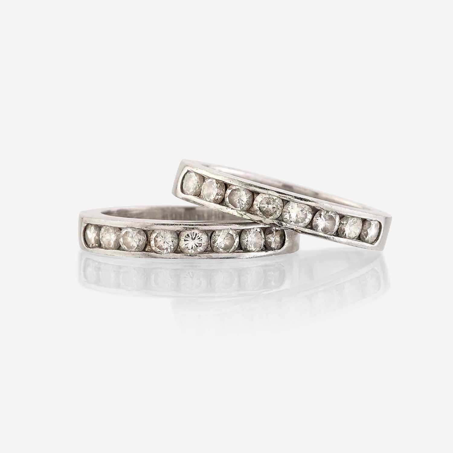Lot 121 - A pair of platinum and diamond rings
