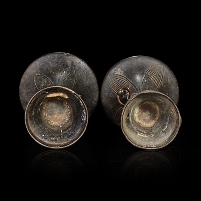 Lot 134 - Two patinated bronze archaistic gu-form vases