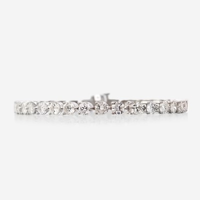 Lot 110 - A diamond and eighteen karat white gold bracelet