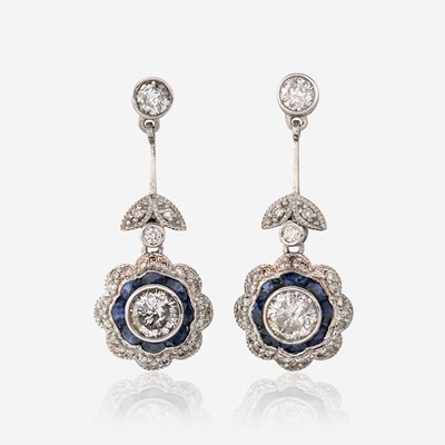 Lot 76 - A pair of diamond, sapphire, and platinum earrings