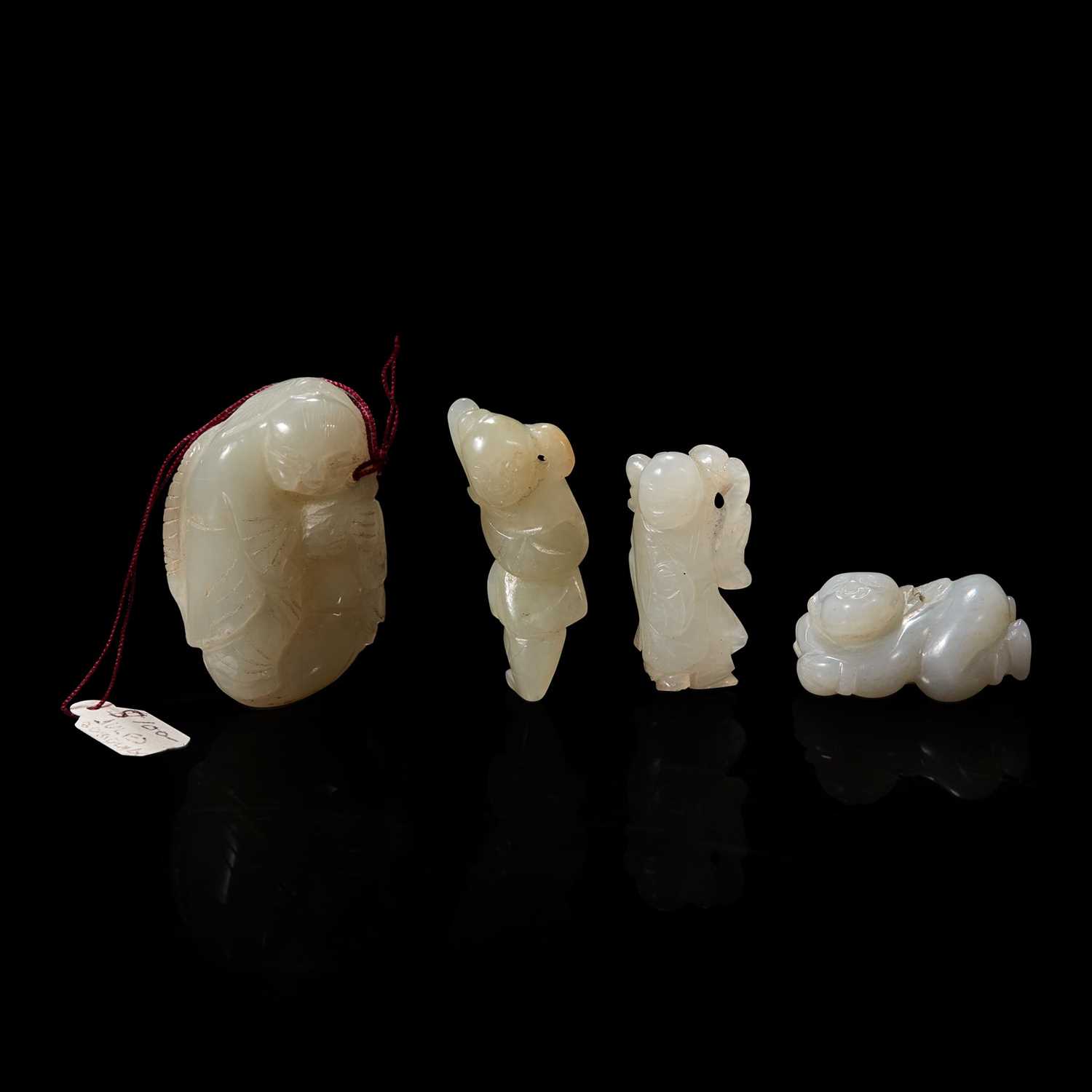 Lot 129 - Group of four assorted small white jade figural pendants