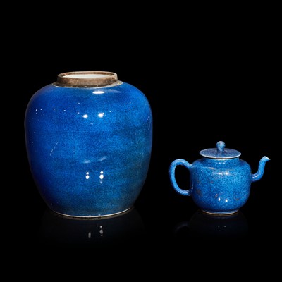 Lot 35 - A Chinese powder-blue glazed teapot and cover and an ovoid jar