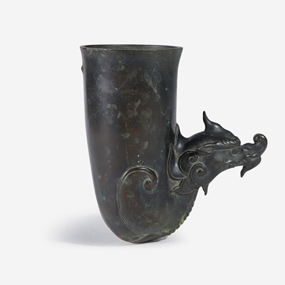 Lot 17 - A patinated bronze rhyton-form fitting or wall vase 来通杯形铜器