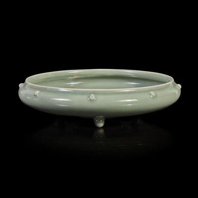 Lot 38 - A Chinese celadon-glazed tripod brush washer