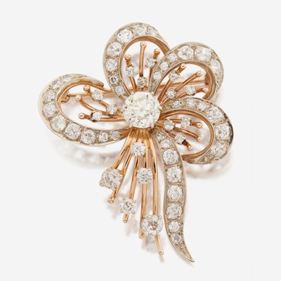 Lot 17 - A diamond and bicolor gold brooch