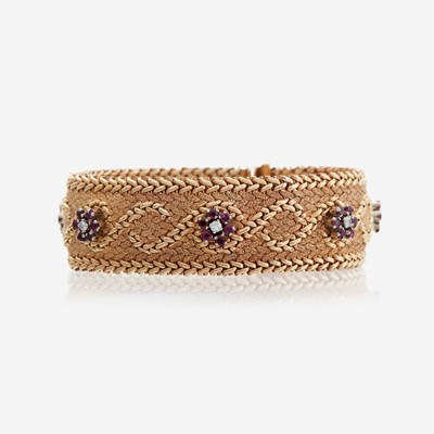 Lot 108 - A gold, diamond, and ruby bracelet