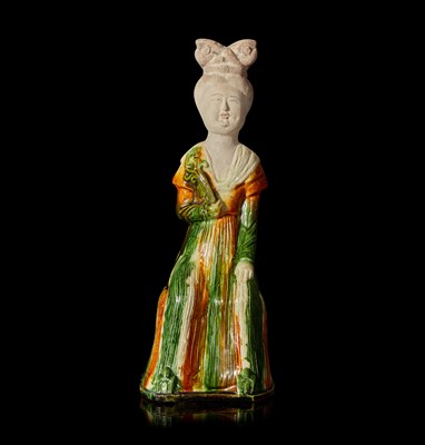 Lot 75 - A Chinese sancai-glazed pottery figure of a seated woman 唐三彩仕女坐像