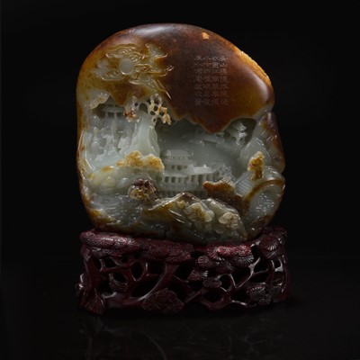 Lot 90 - A Chinese russet and pale celadon jade "Mountain" boulder 玉雕山子及底座