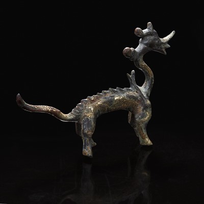 Lot 7 - A small Chinese gilt-bronze figure of a striding dragon 铜鎏金行龙