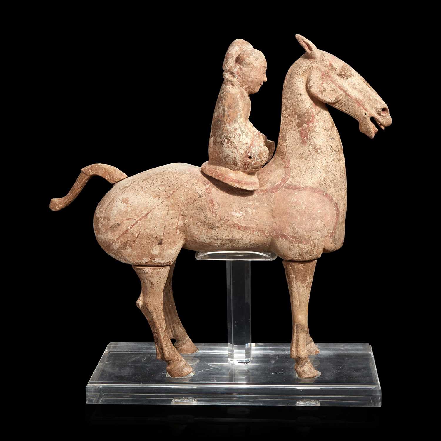 Lot 88 - A Chinese large painted pottery figure of a horse and rider