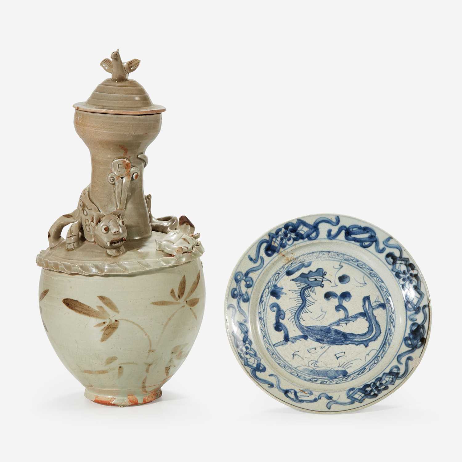 Lot 7 - A Chinese iron-brown decorated jar and cover and a blue and white "Phoenix" dish