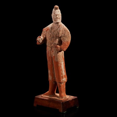 Lot 90 - A Chinese painted pottery figure of a foreign attendant 彩繪胡人陶俑一件