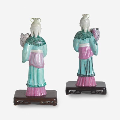 Lot 123 - A Pair of Chinese Export Porcelain Famille Rose Candlestick Figures