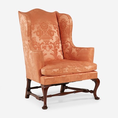Lot 11 - A Queen Anne upholstered mahogany and maple easy chair