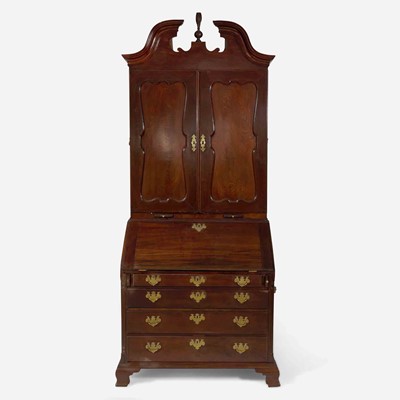 Lot 2 - A Chippendale carved mahogany secretary desk and bookcase