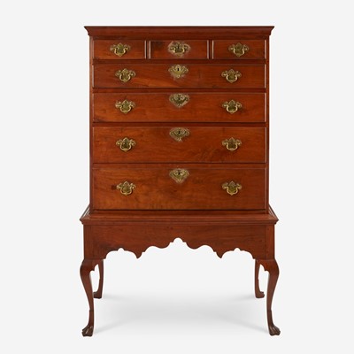 Lot 67 - A Queen Anne carved walnut chest-on-frame