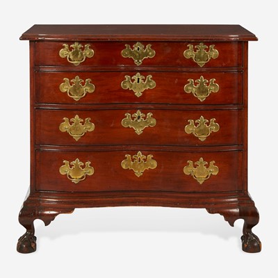 Lot 19 - A Chippendale carved mahogany oxbow chest of drawers