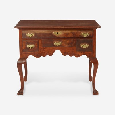 Lot 59 - A Queen Anne carved walnut dressing table
