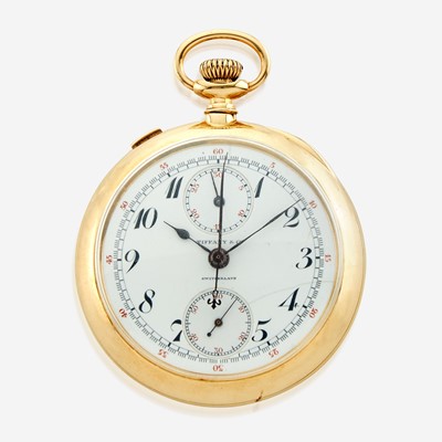 Lot 122 - An eighteen karat  gold openface split second chronograph pocket watch, Tiffany & Co.