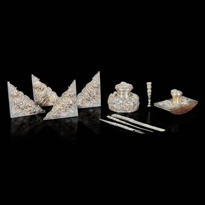 Lot 57 - An eight-piece Chinese silver desk set with two added pieces 银质器具一组八件及两附件